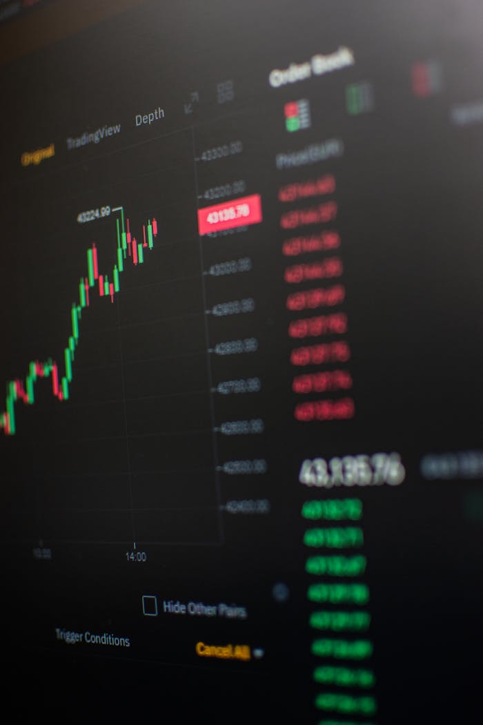 Close-up view of a cryptocurrency trading screen showing market trends and data.